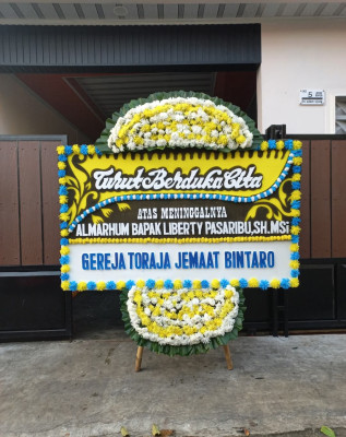 Papan Bunga Duka di Tuksari
